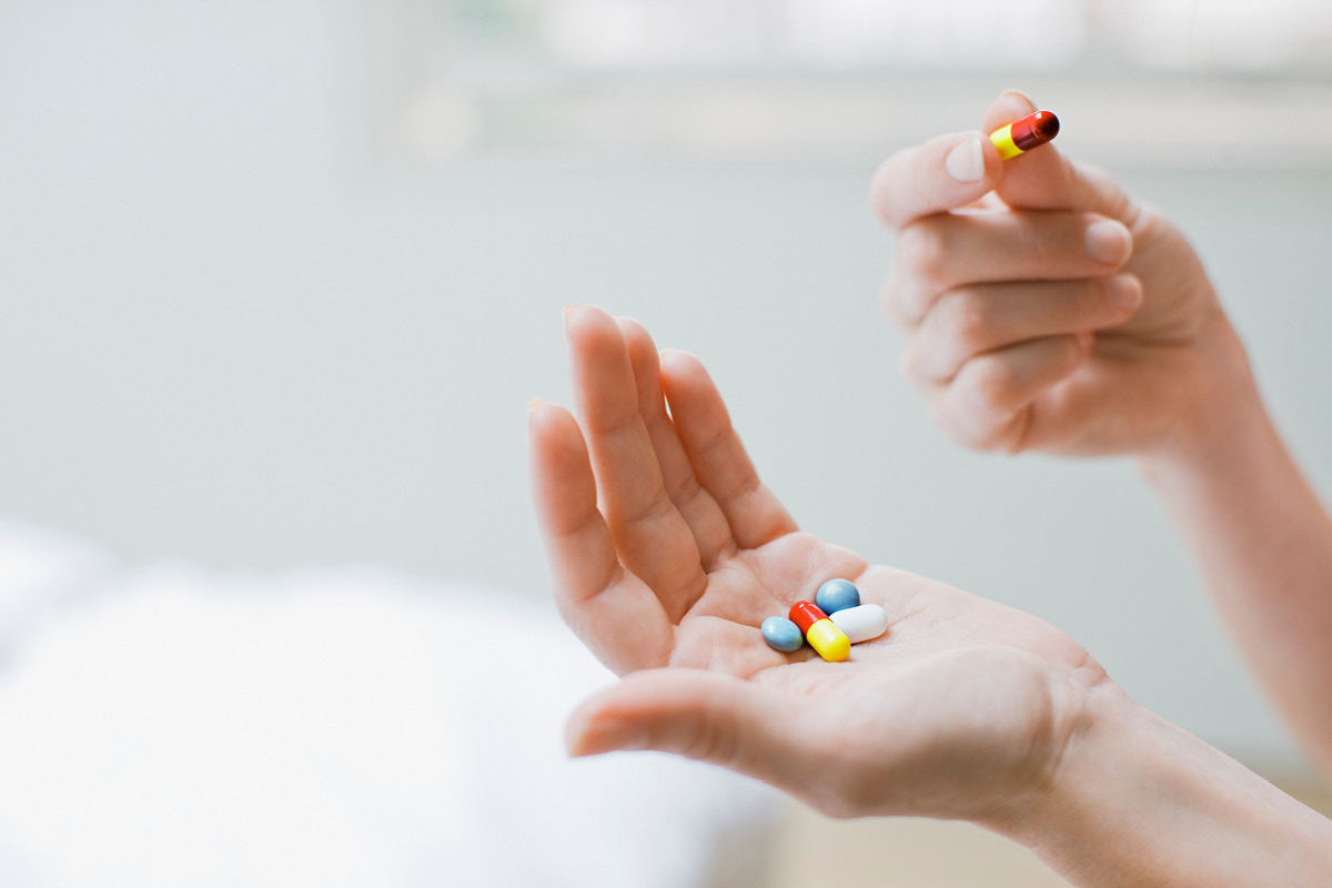 photo of vitamins in a hand