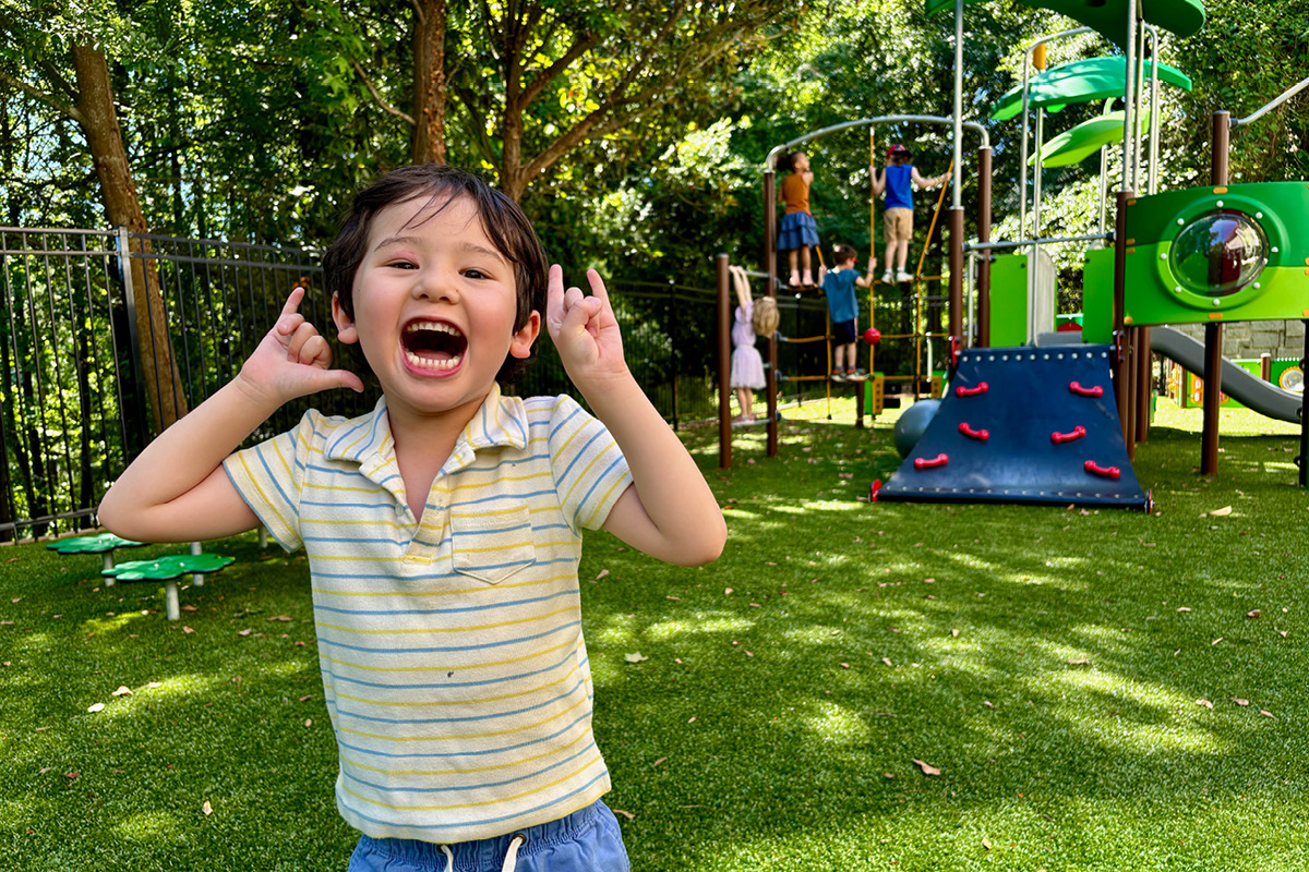 Child on the playground at Emory's Autism Center